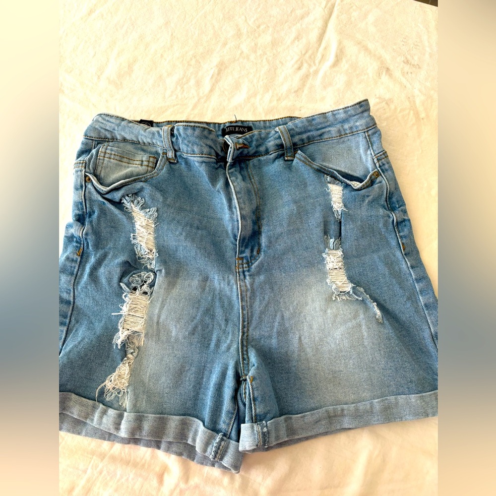 Elite Jeans. Cut offs. Size 15/32 very distressed, cuffed‎ bottoms.